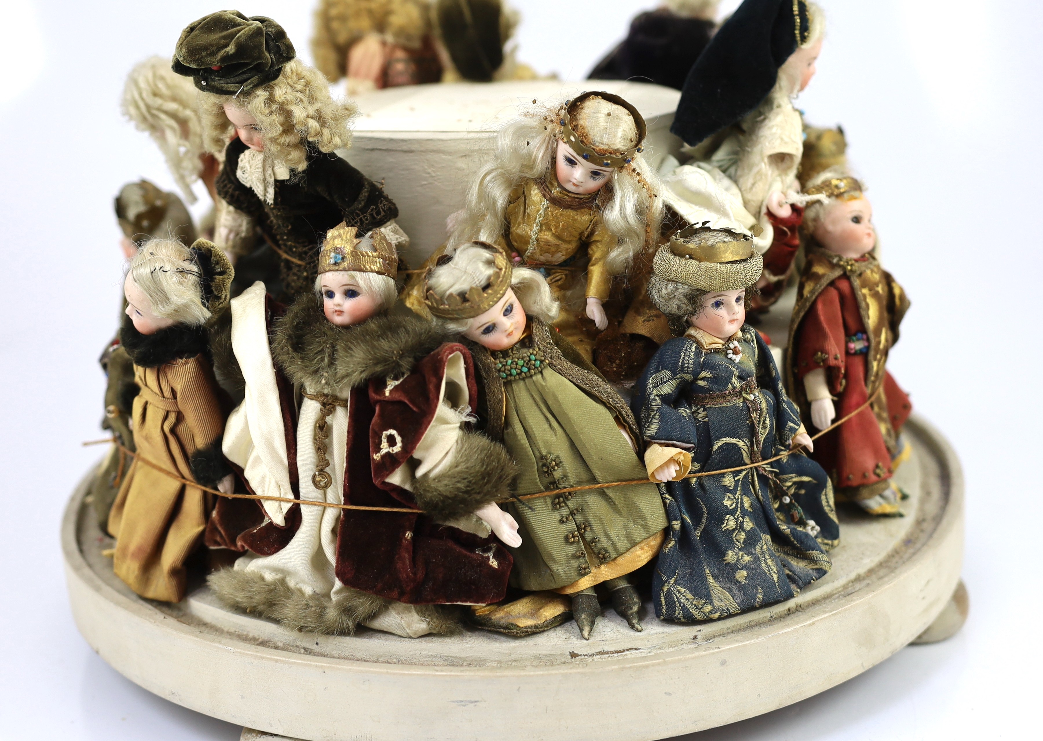 A rare collection of twenty-three German all-bisque dolls, circa 1910